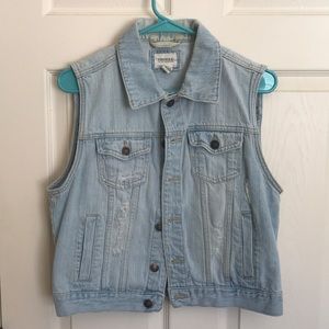 Sleeveless distressed jean jacket